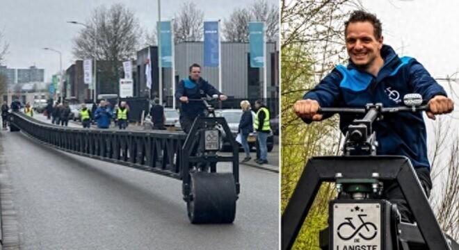 荷兰八位自行车爱好者造出55米长自行车 破吉尼斯世界纪录